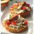Bruschette di pane al pomodoro e mozzarella di bufala