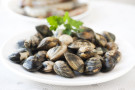 Malloreddus con vongole, pomodorini e bottarga di tonno Malloreddus con vongole, pomodorini e bottarga di tonno
