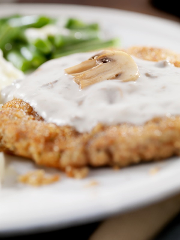 Scaloppine con pomodori secchi e mozzarella 