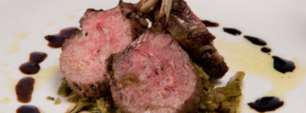 Academia Barilla propone il carré d'agnello con carciofi